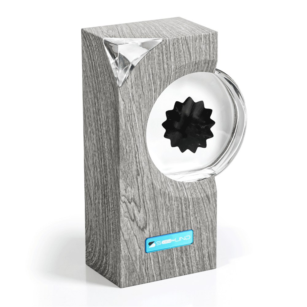 A clean product view of the gray sovenomund ferrofluid rhythm lamp with the glass chamber and black fluid visible.