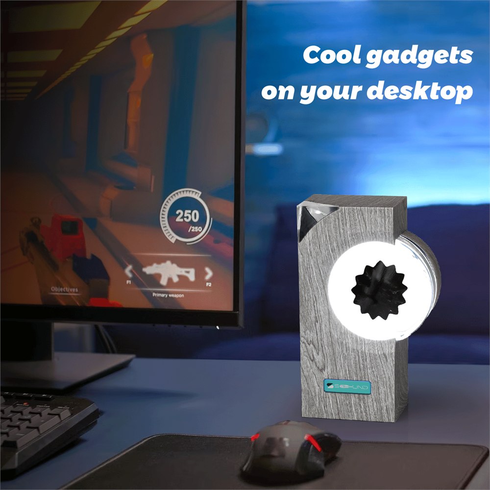 The ferrofluid visualizer displayed as a compact desktop gadget beside a monitor.