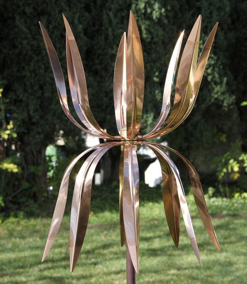 Polished copper curved blades on the Dancing Octopus wind sculpture