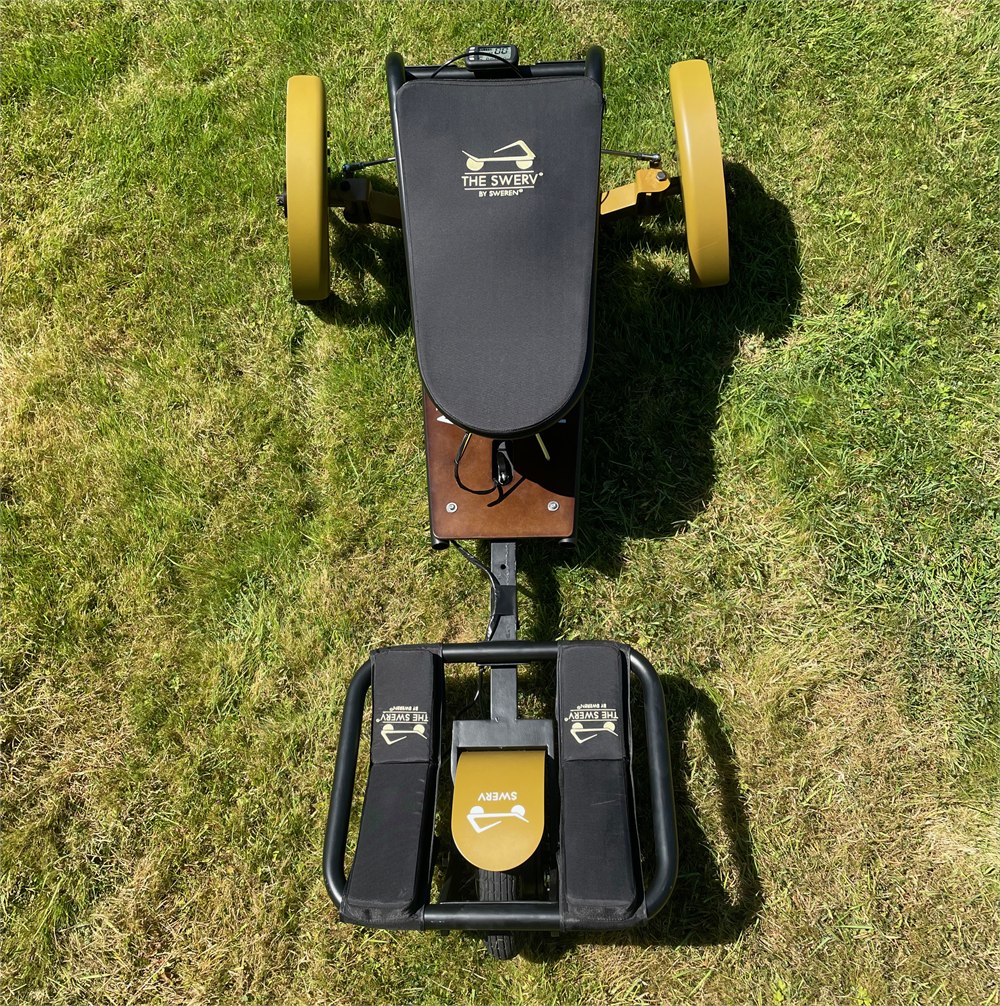 Top-down view of a Sweren Swerv trike showing the prone chest board and wheel layout