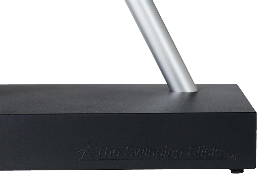 Close-up of The Swinging Sticks black base and silver support rod