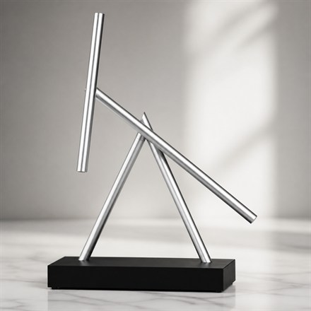 This Kinetic Energy Sculpture Turns Your Desk Into A Tiny Physics Show