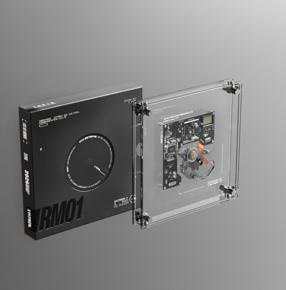 SYITREN RM1 transparent CD player beside its black packaging