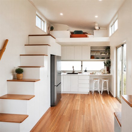 This Family Tiny Home Fits Two Lofts, a Bathtub, and a Real Kitchen