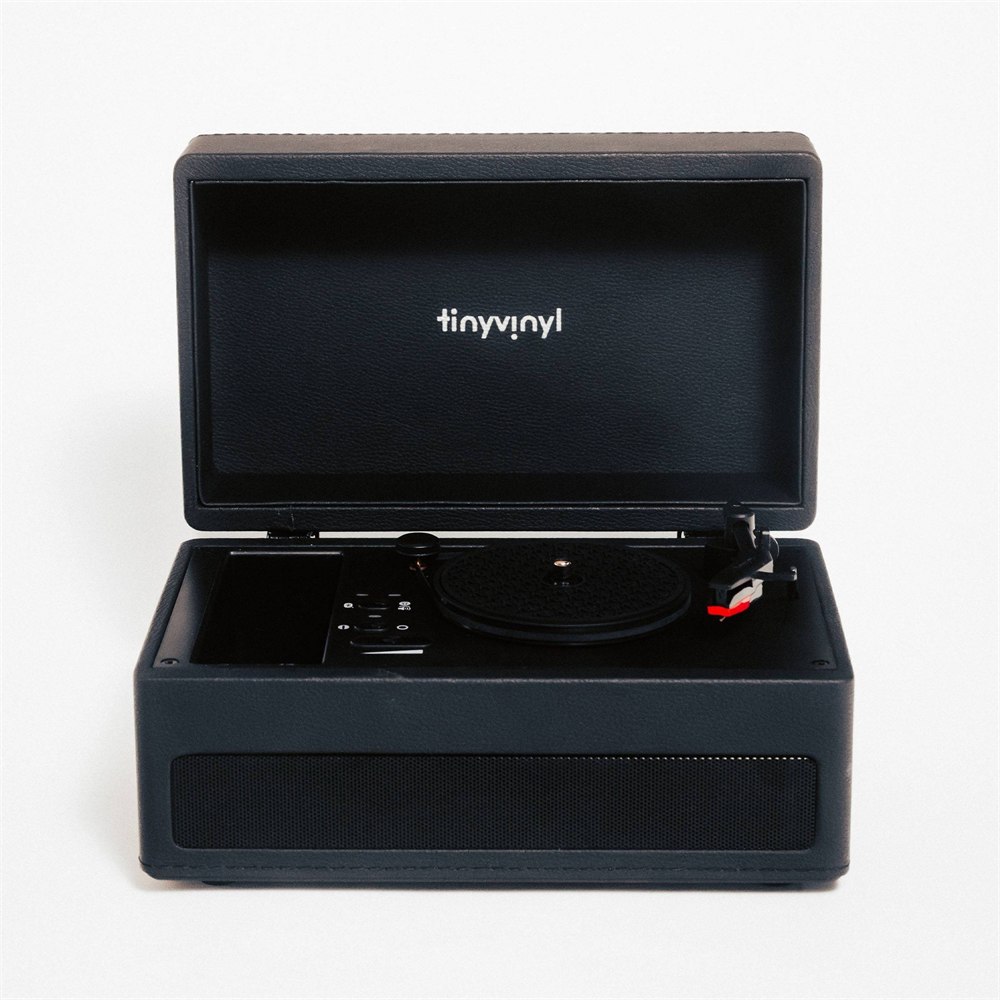 Tiny Vinyl Player open with its mini turntable, tonearm, and front speaker grille