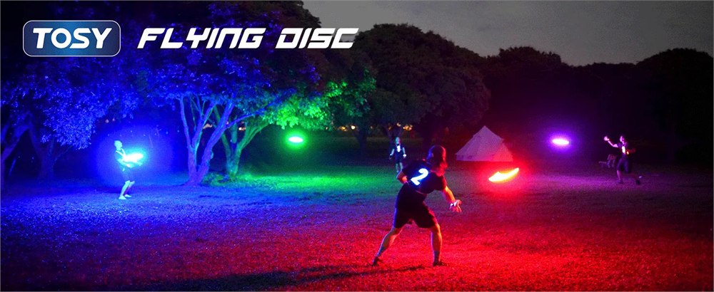 TOSY flying disc glowing during night play in a park