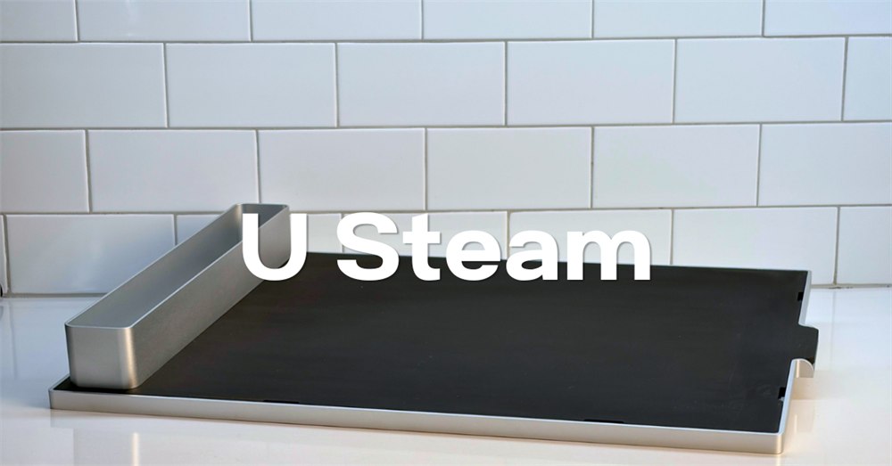U Steam low-profile metal tray and reservoir on a kitchen counter
