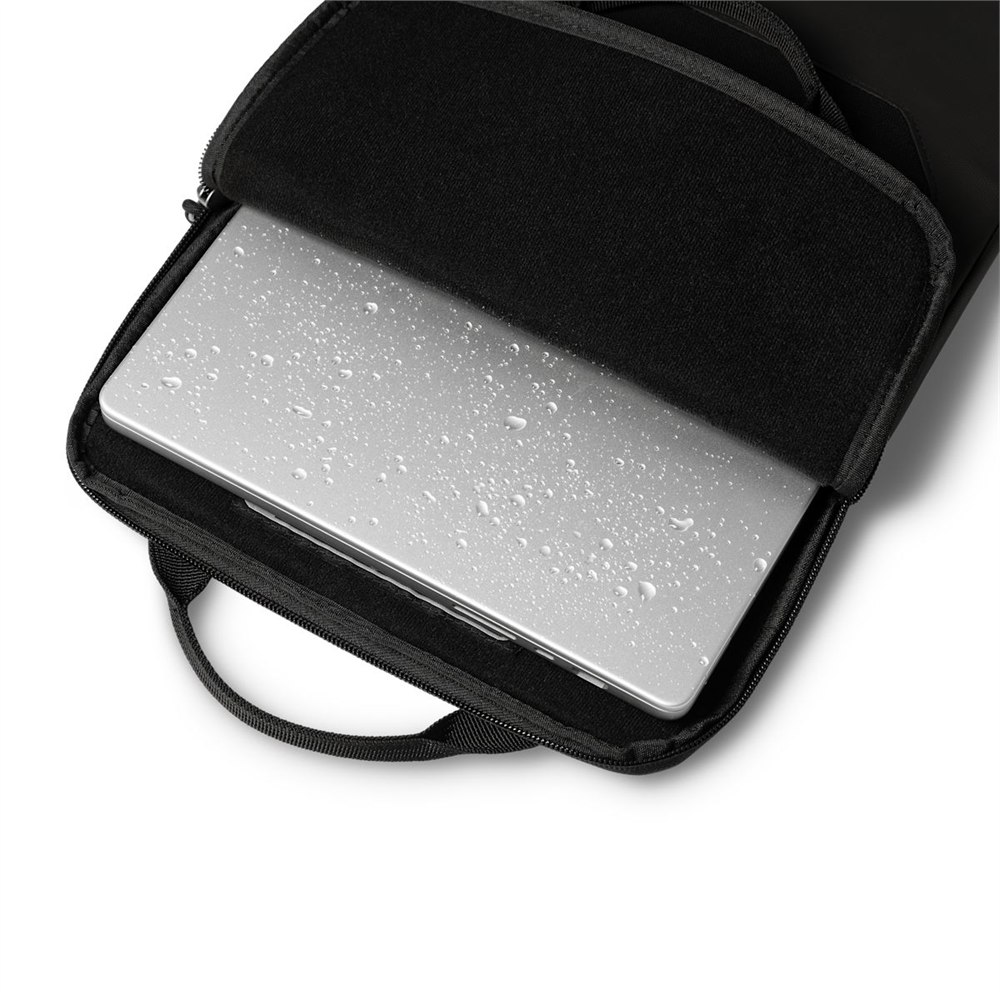 Damp laptop inside the UAG DRYOUT moisture-removing sleeve