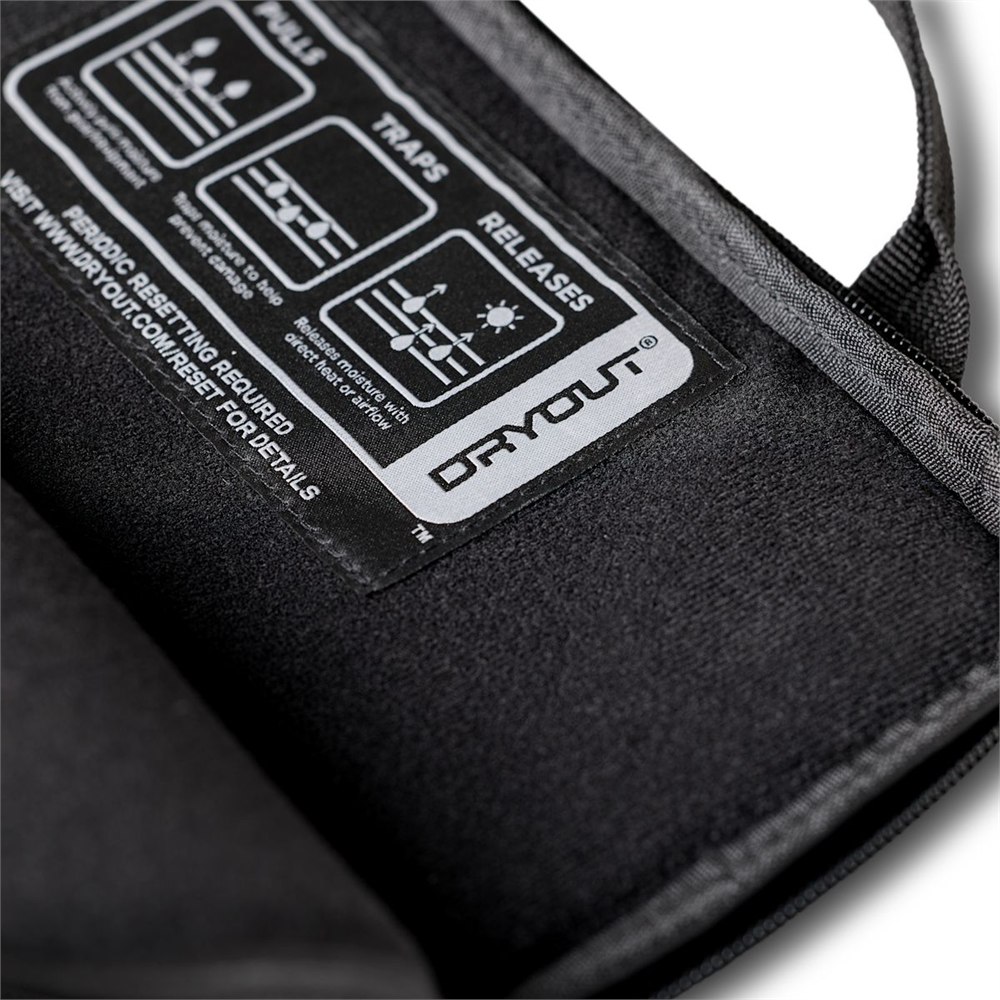 Close view of the DRYOUT label and textured laptop sleeve material