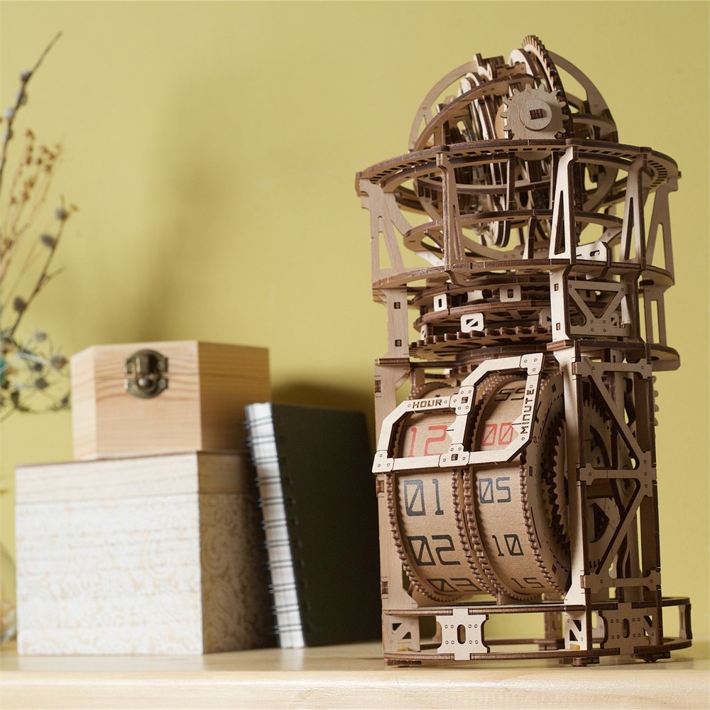 Finished UGEARS Sky Watcher wooden clock displayed on a desk