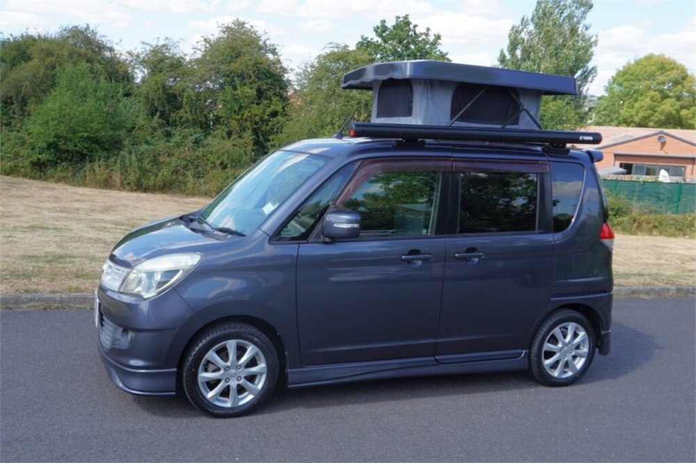Wellhouse Suzuki Solio micro camper with pop-up roof open