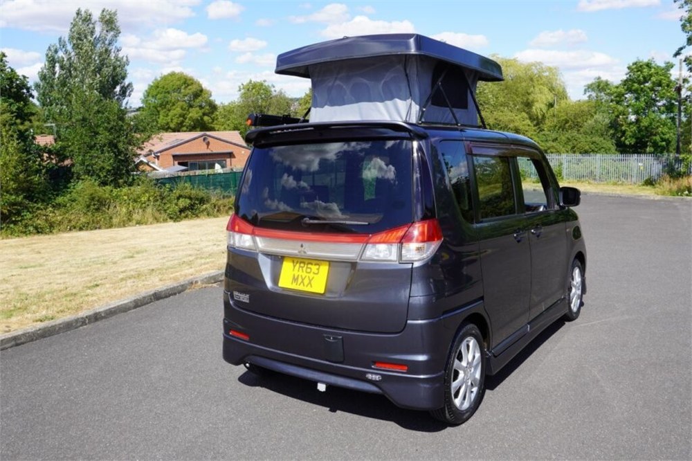 Mitsubishi Delica D:2 micro camper rear angle with elevated roof