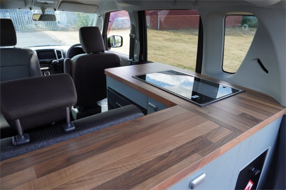 Suzuki Solio micro camper kitchenette and storage detail