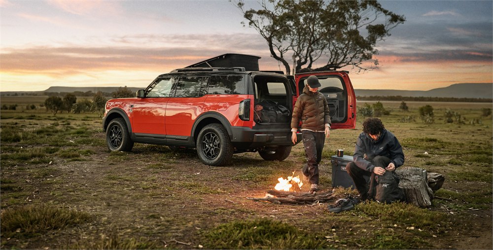 Ford Bronco Basecamp prototype with raised pop-up roof at camp