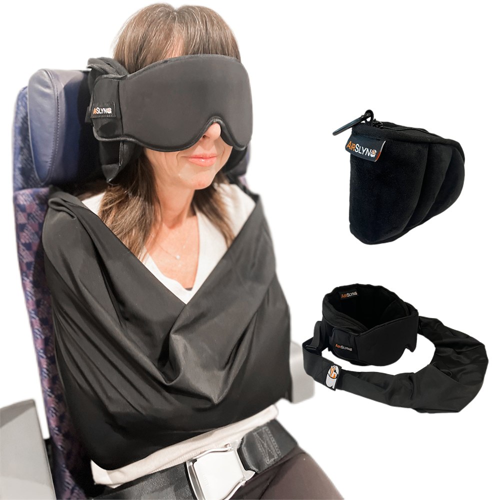 AirSlyng pillow, eye mask and body sling shown on an airplane seat