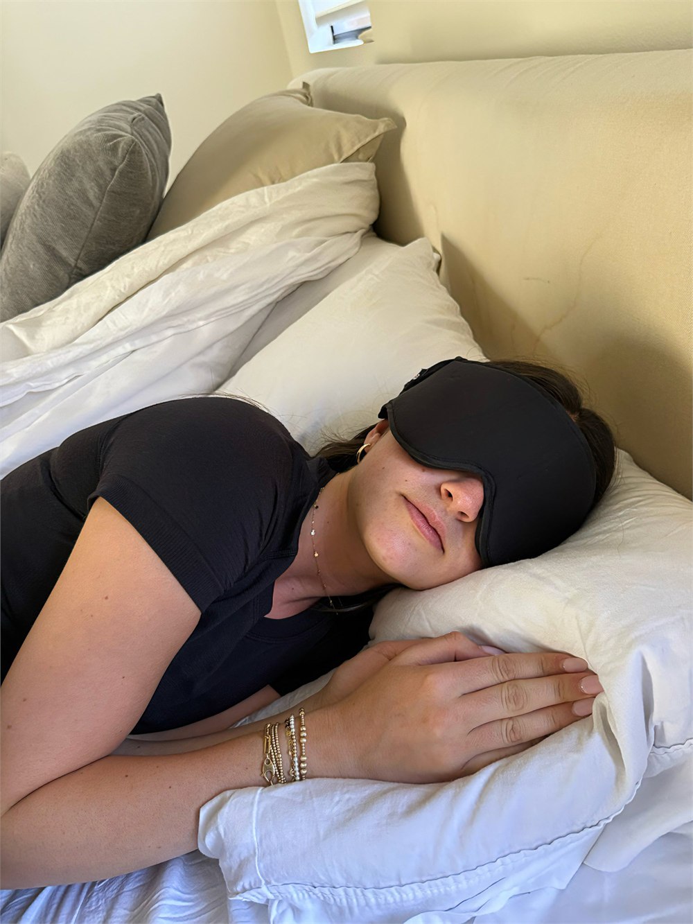 AirSlyng eye mask worn separately while resting in bed