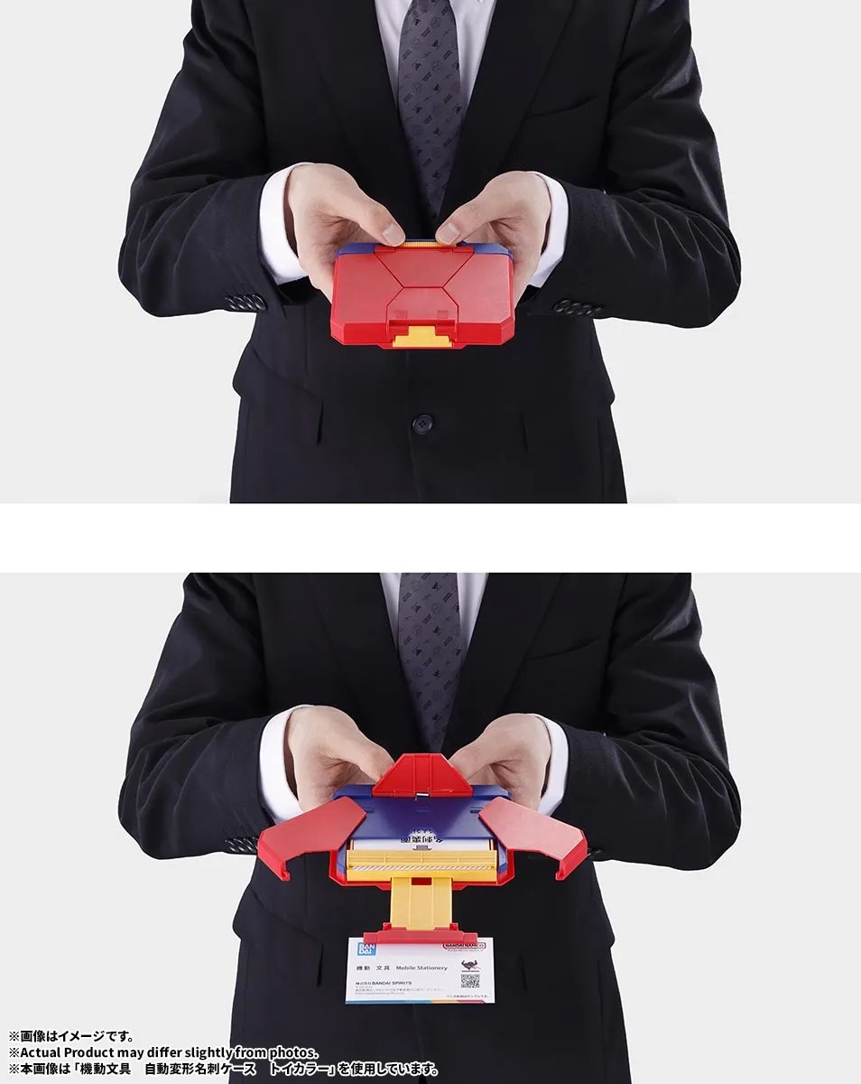 Person holding the Bandai automatic transforming business card case before and after opening