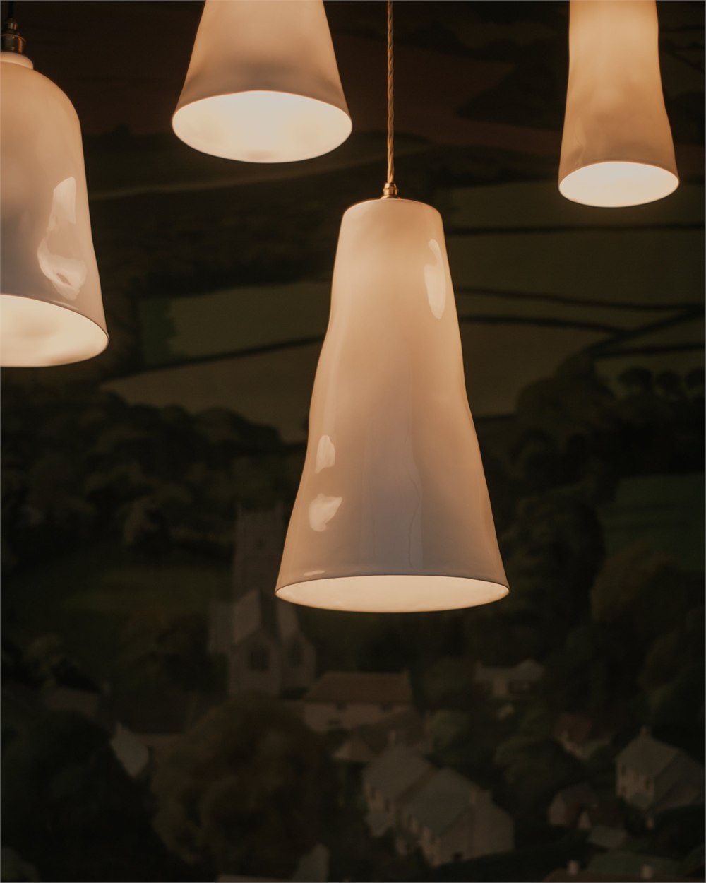 Illuminated Big Slim among other Feldspar pendant designs