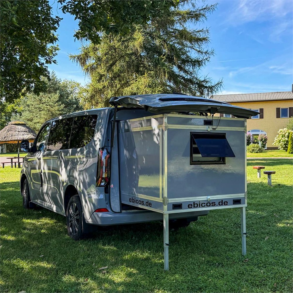 Ebicos Happy Dreamer camper pod extended from a silver van