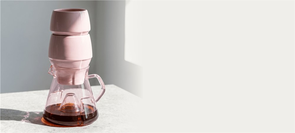 Stacked pink porcelain coffee cups