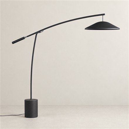This Counterweighted Floor Lamp Moves Its Long Arm With a Twist