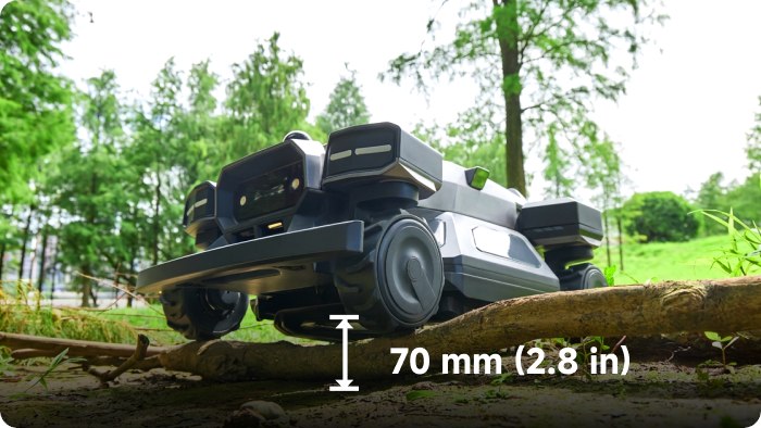 ARANIX robot mower demonstrated crossing a raised root