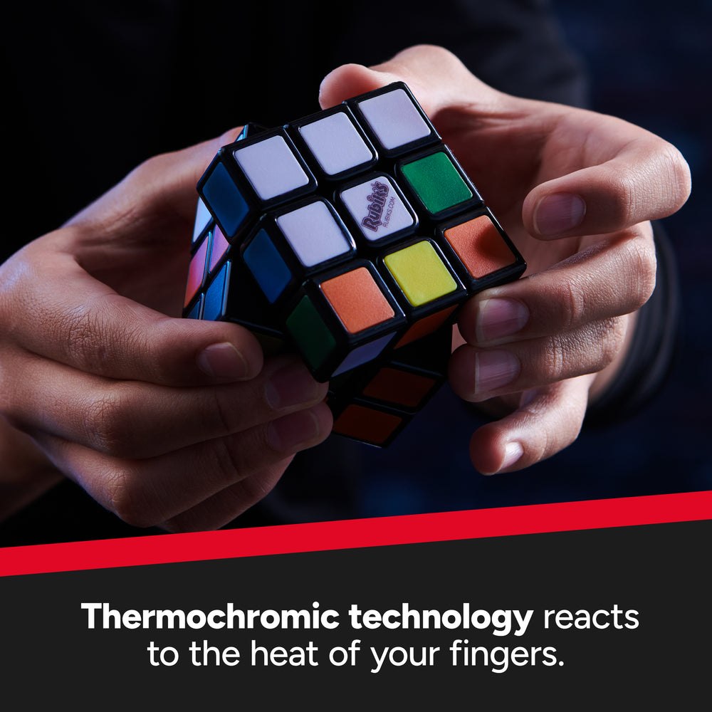 Hands holding the heat-sensitive Rubiks Phantom cube