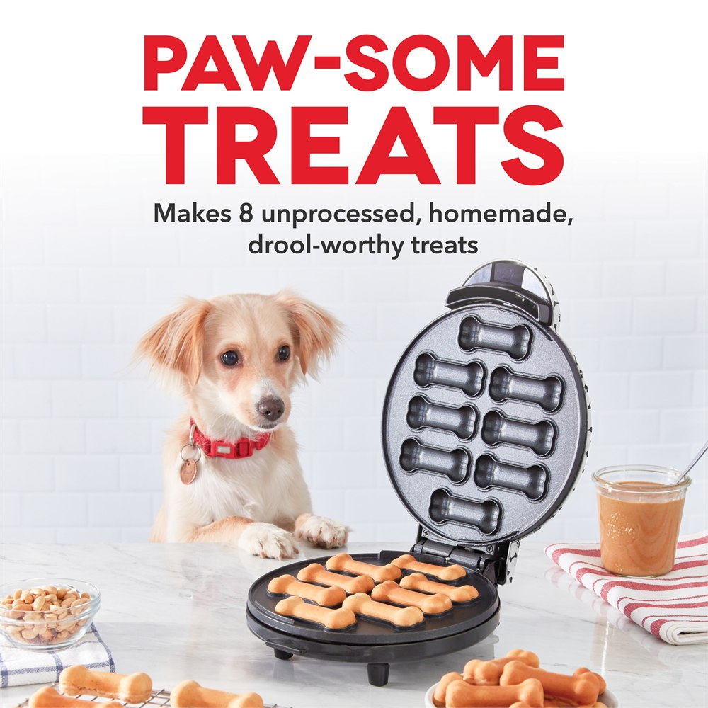 Dash eight-treat cooker shown with finished treats and a dog