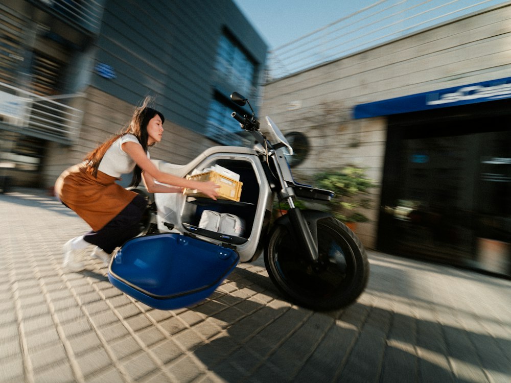Open blue side door and central cargo space on the ANY LUV1