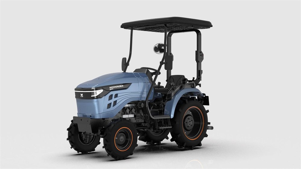 Moonrider compact electric tractor with its closed canopy