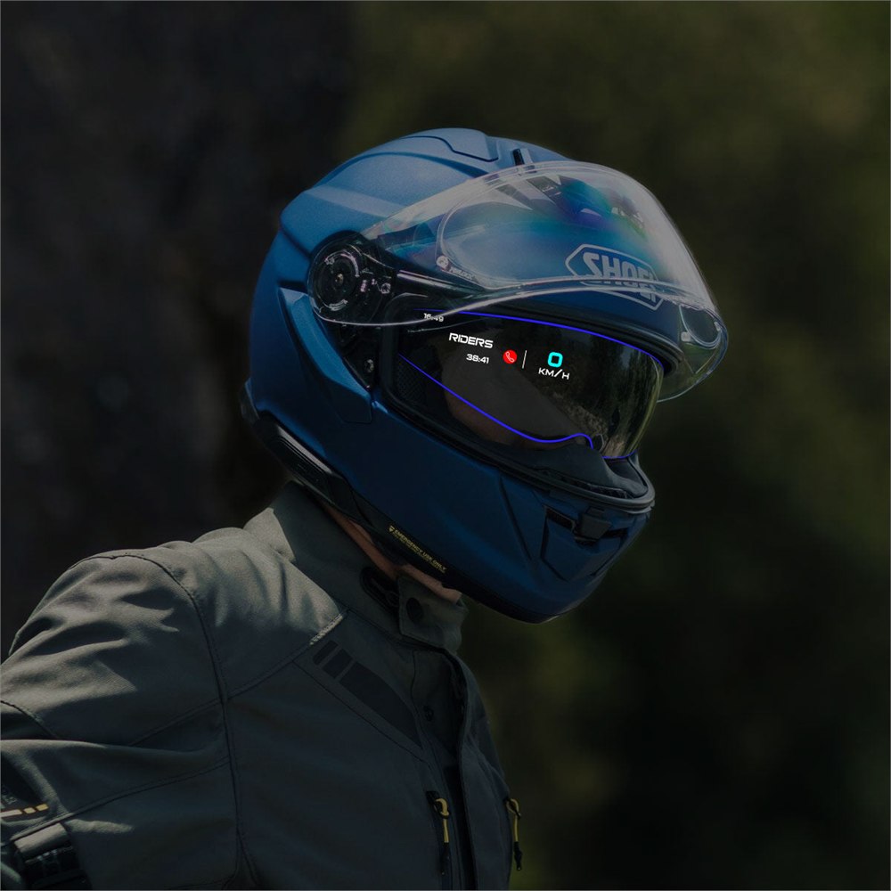 Rider wearing the Shoei EyeLights smart touring helmet