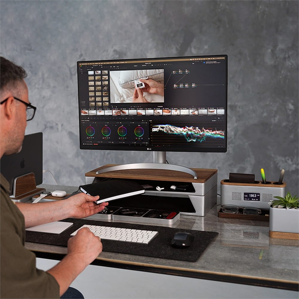 Focus Gap modular desk system arranged under a monitor with storage trays and accessories