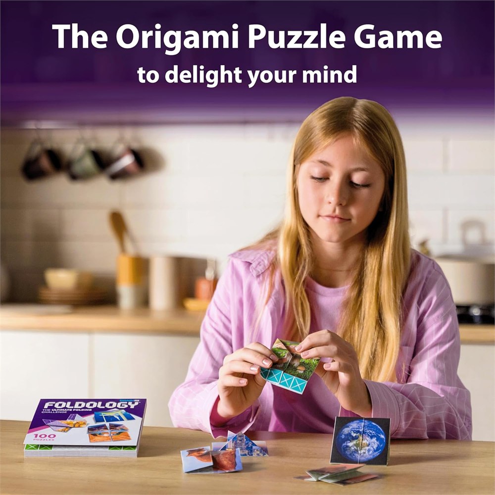 Young player solving a paper folding puzzle at a table