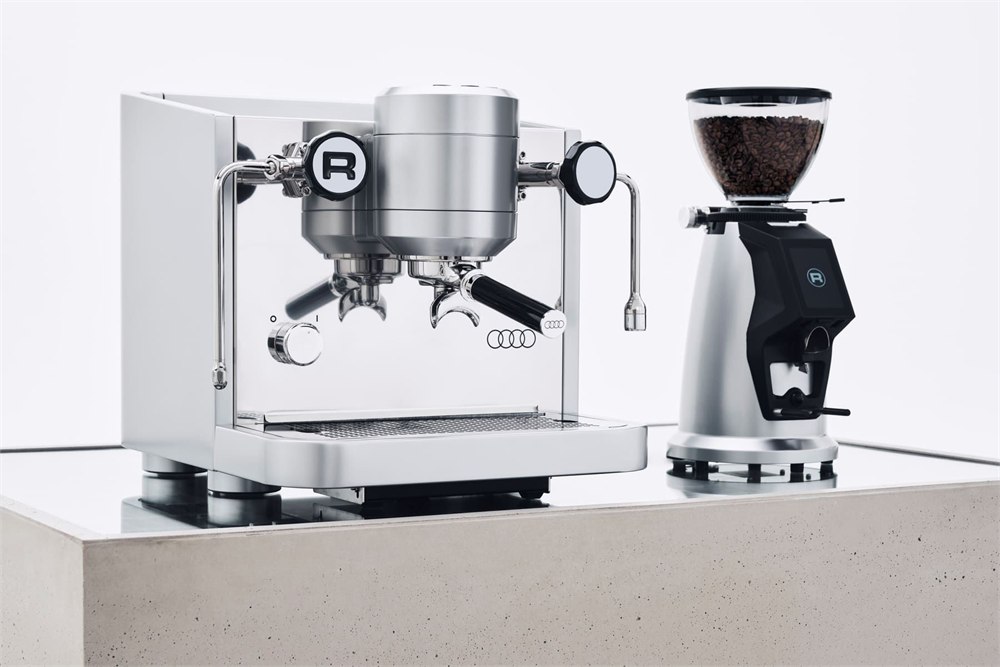 Rocket x Audi espresso machine shown beside the separate Spluga grinder