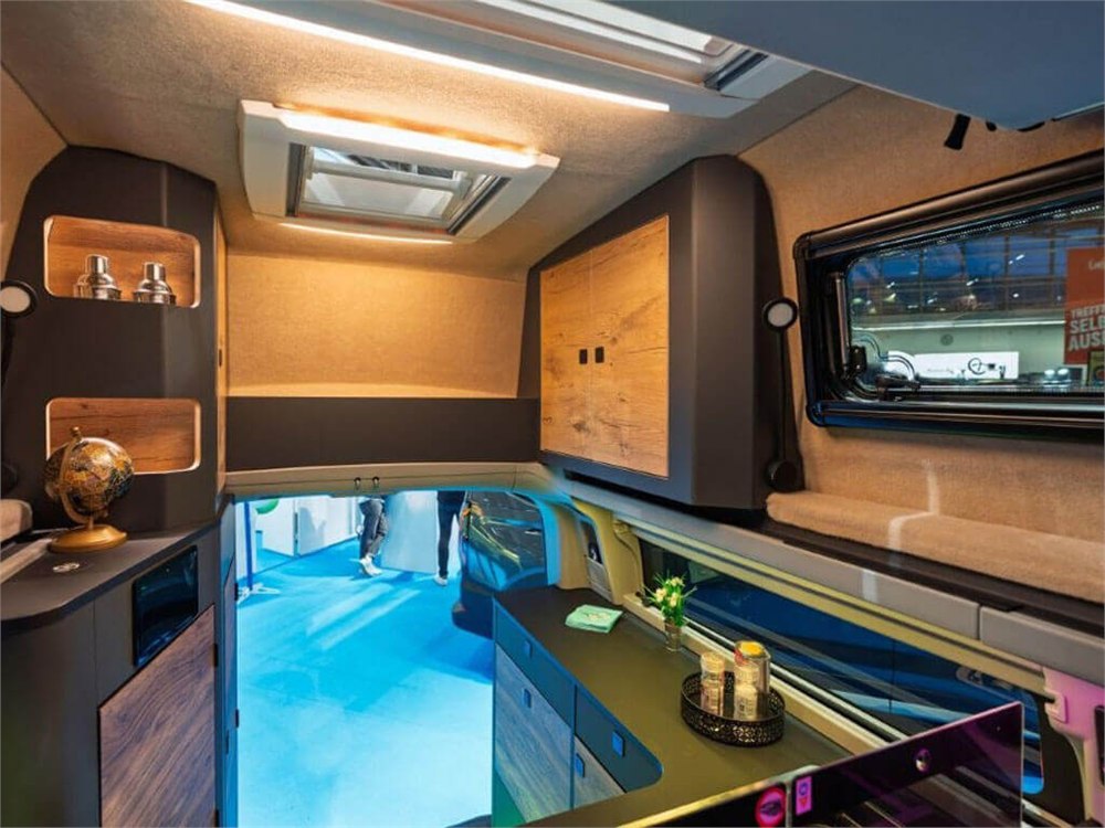 Cabin storage and rear living area inside the Nugget Twin display vehicle