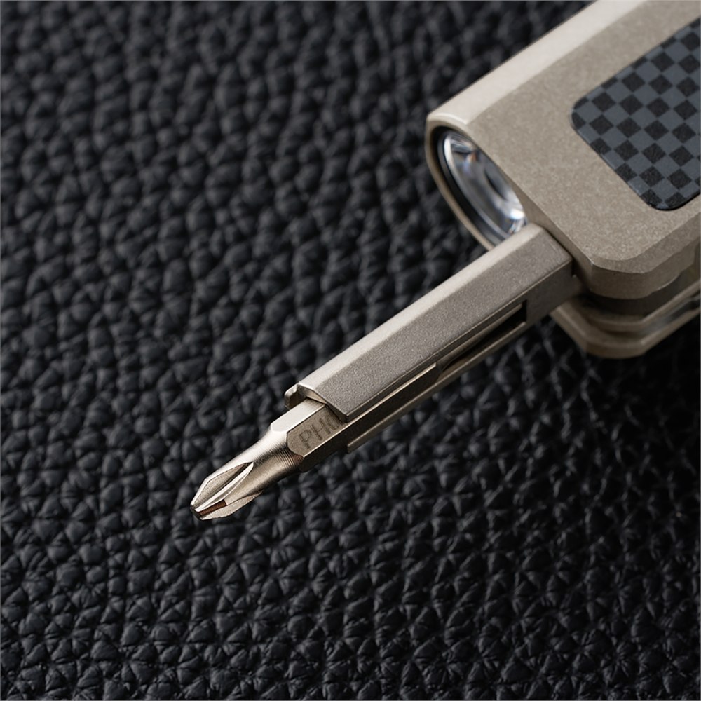 Magnetic folding holder with a Phillips screwdriver bit