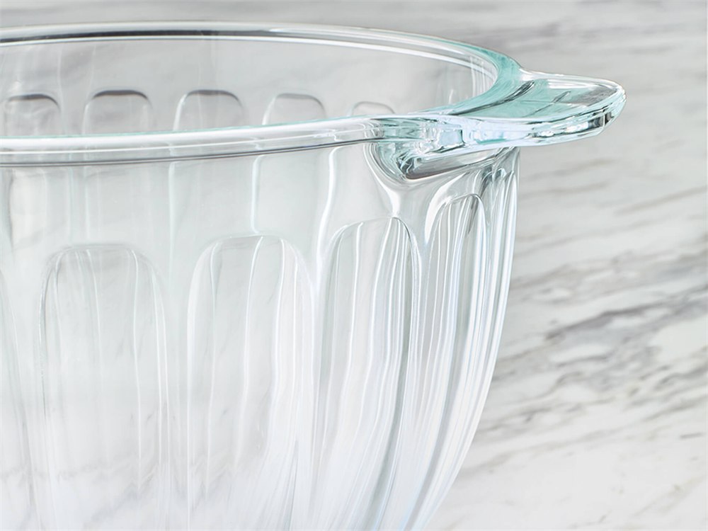 Close view of the fluted glass bowl and its pot-style handle