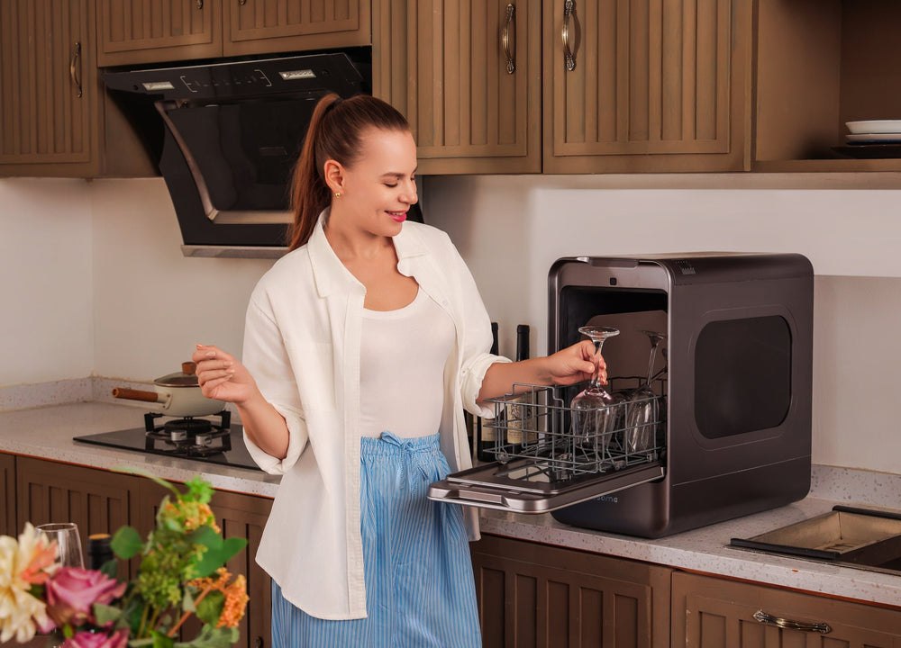 LISSOME R1 countertop dishwasher loaded with glasses and dishes