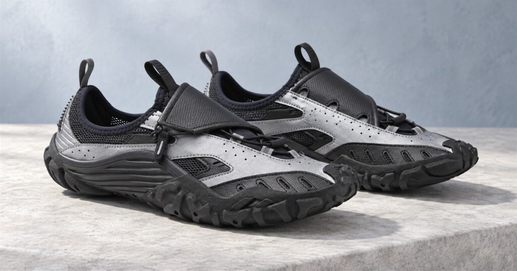 Editorial illustration of black and silver mesh Water Moc shoes