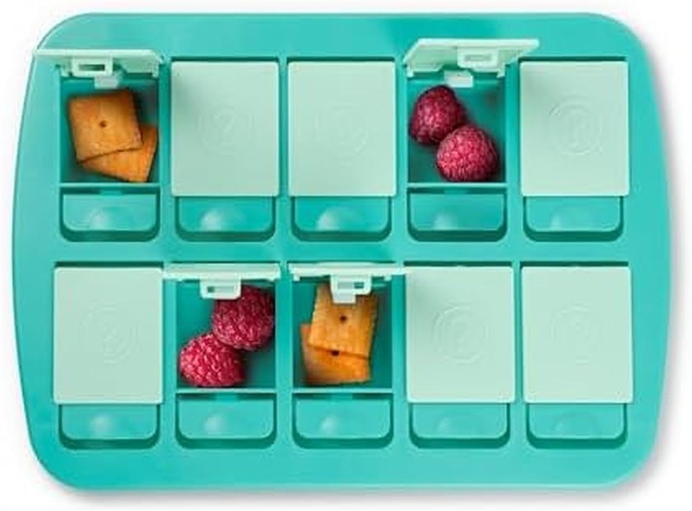 Genuine Fred MINI Match UP snack tray with several compartments open and snacks inside