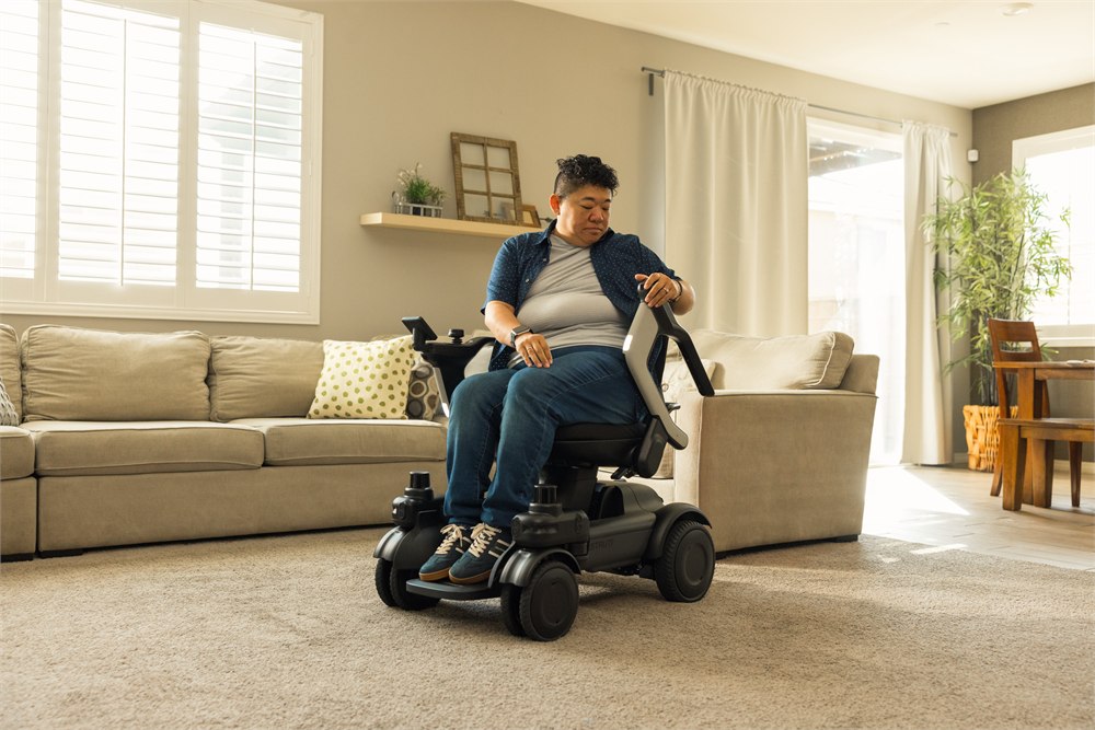 Fold-up armrest on the Strutt mobility chair