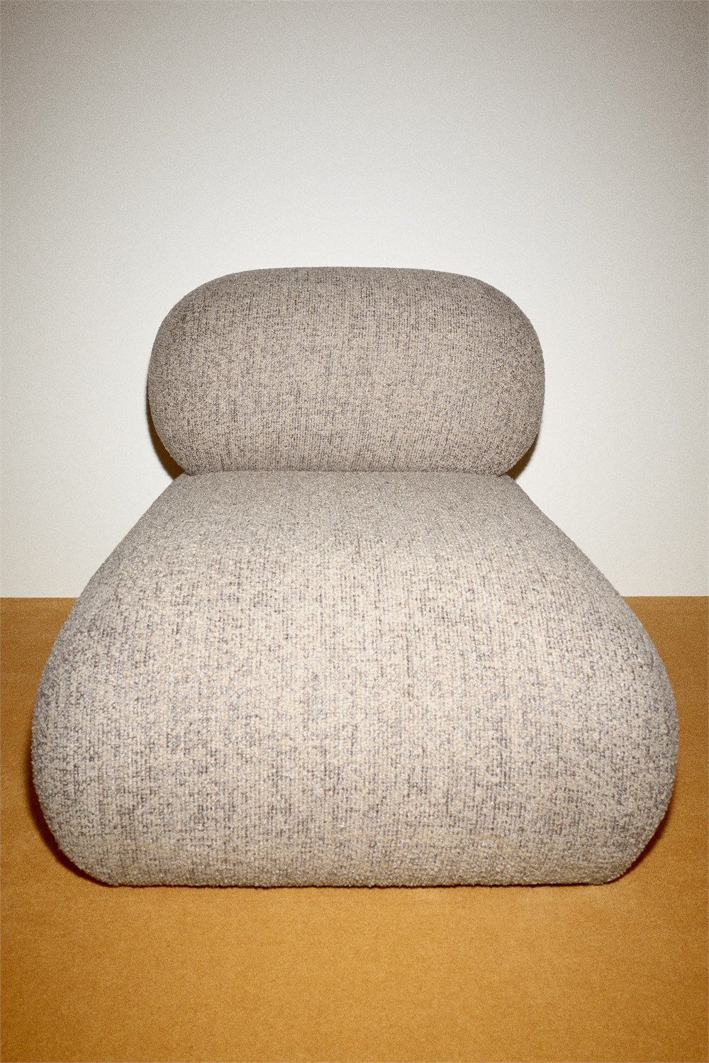 Front view of the Poma accent chair