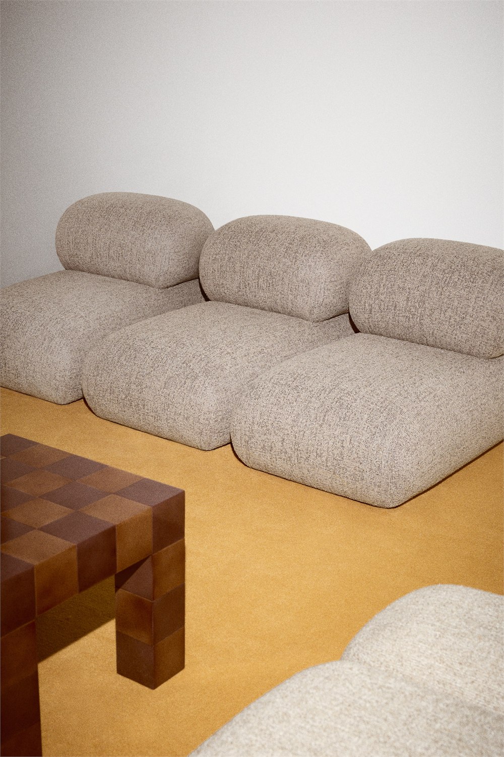 Three Poma chairs arranged side by side