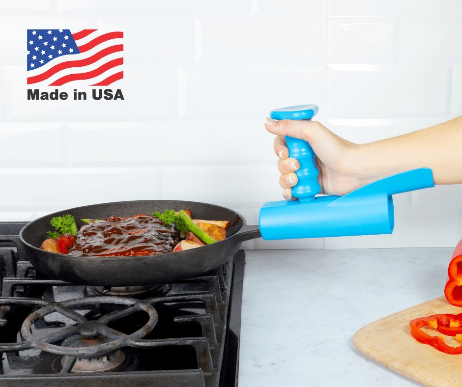 Blue Pan Buddy lifting a skillet on a stovetop
