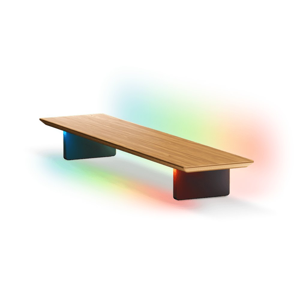 Nanoleaf walnut LED monitor stand with colored ambient lighting