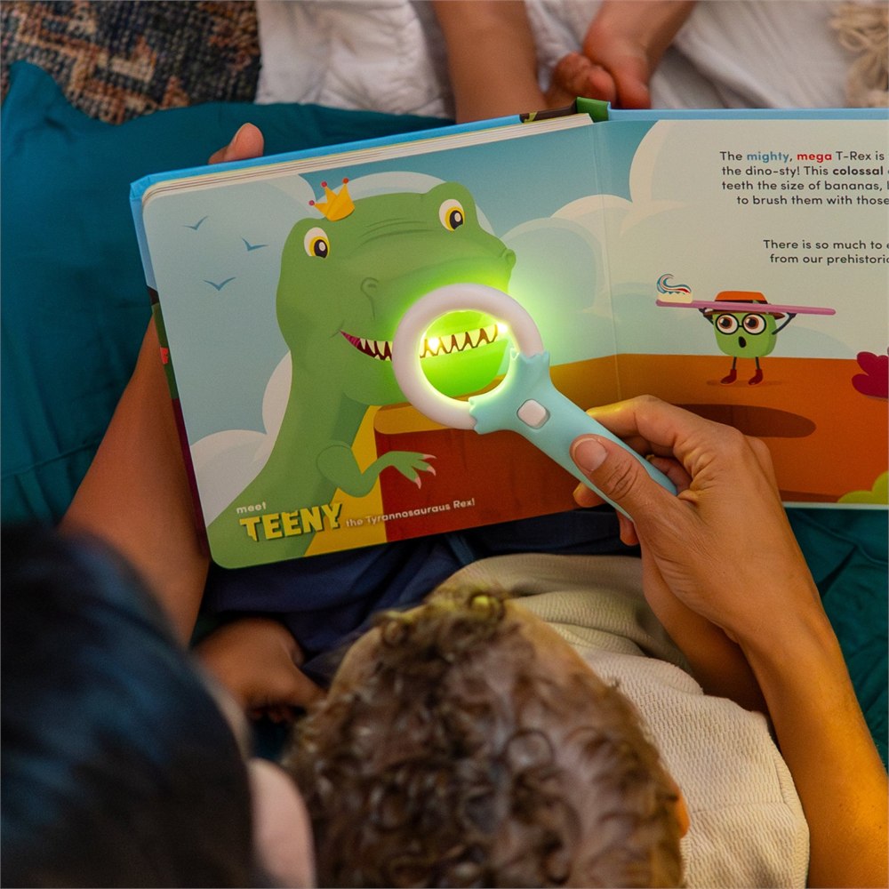 Magic Magnifier revealing a dinosaur in the Pippa book