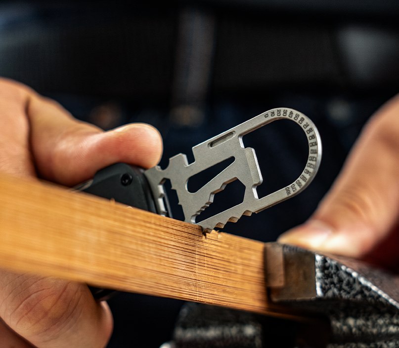 TOOLT saw plate demonstrated on a small wooden strip
