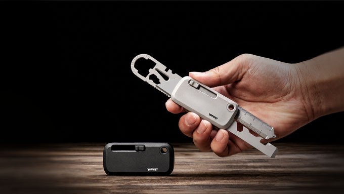 Silver TOOLT held open above a closed black version