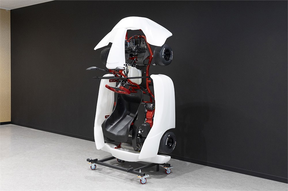 GR KART on its separate upright storage stand
