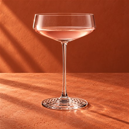 These Wine and Cocktail Glasses Stand on Sculpted Ripple Bases